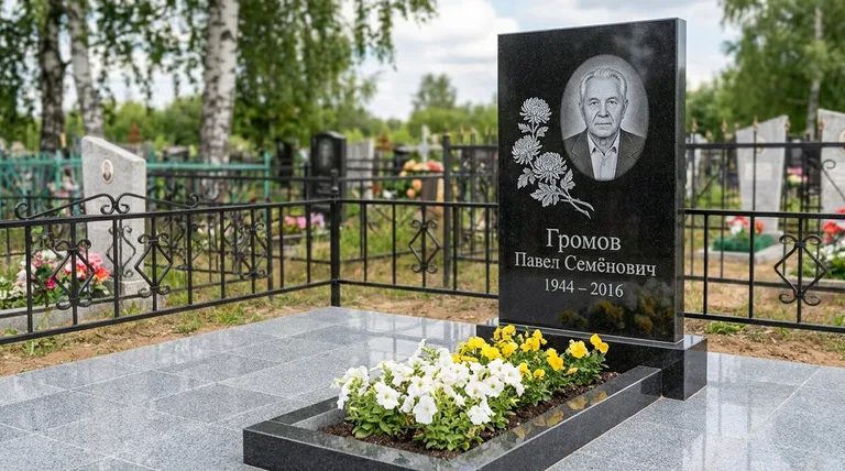 Памятник с гравировкой хризантем — выполненная работа «Громов» в Белгороде