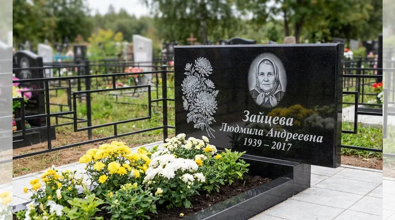 Памятник с гравировкой хризантем — выполненная работа «Зайцева» в Белгороде