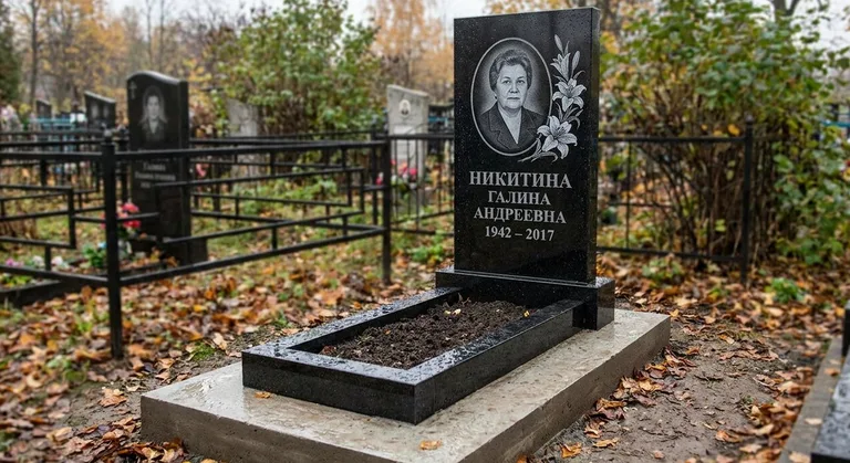 Памятник с гравировкой лилий — выполненная работа «Никитина» в Белгороде