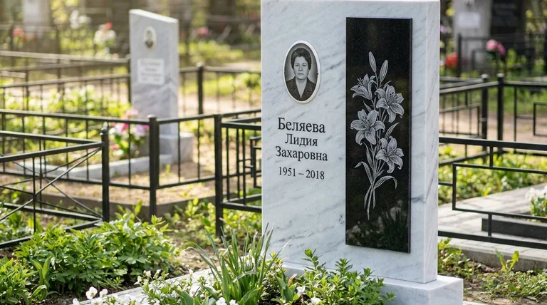 Памятник с гравировкой лилий — выполненная работа «Беляева» в Белгороде