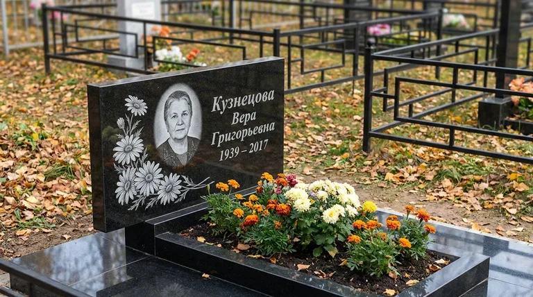 Памятник с гравировкой ромашек — выполненная работа «Кузнецова» в Белгороде