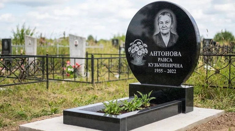 Памятник с гравировкой ромашек — выполненная работа «Антонова» в Белгороде
