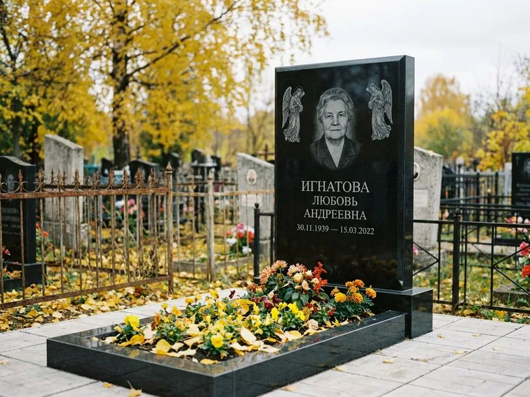 Памятник с гравировкой ангела — гравировка двух ангелов по сторонам портрета, работа «Игнатова» в Белгороде