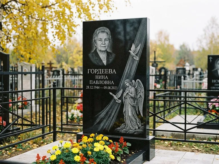 Памятник с гравировкой ангела — гравировка ангела с голубем по диагонали стелы, работа «Гордеева» в Белгороде
