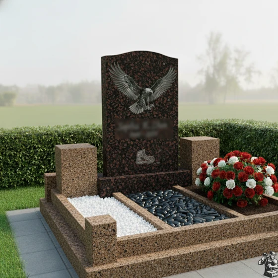 Гранитный памятник с барельефом орла, гранит амфиболит, в Якутске